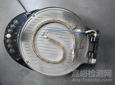 在电压浪涌试验中，是整个电热元件断开还是仅接地断开?